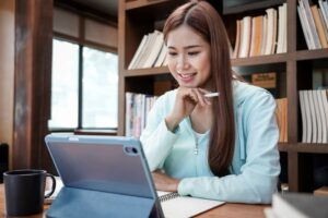 ABM strand student studying using a tablet