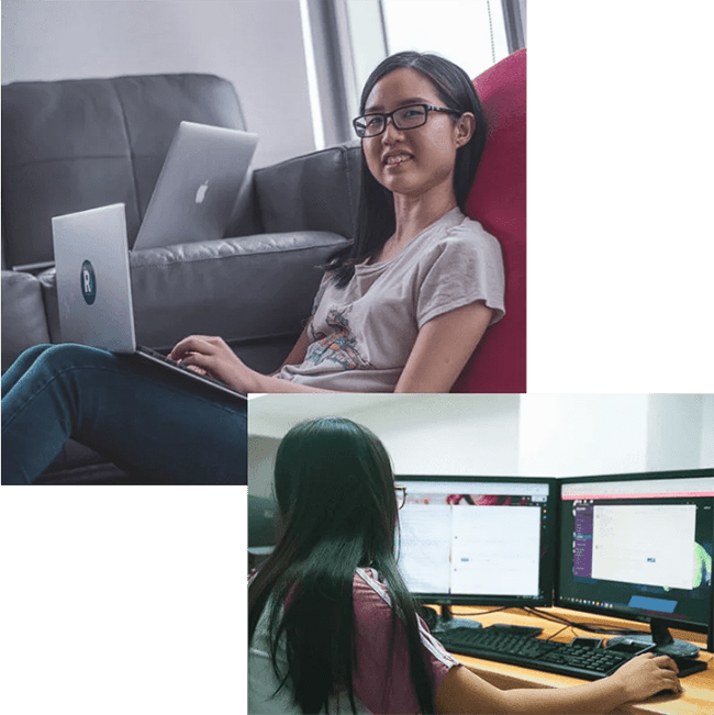 a female student happily studying on her computer